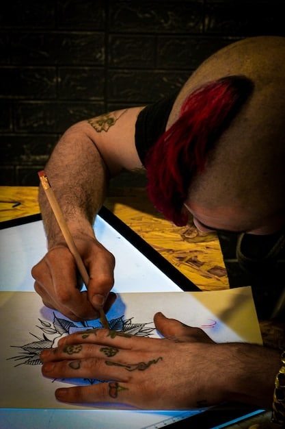 A close-up shot showcasing a manga artist's hands meticulously inking a detailed manga panel, highlighting the precision and skill required in manga creation.