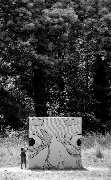 A black and white panel from the Is manga with expressive line work, capturing a character in a reflective moment, visually representing the theme of self-discovery and inner turmoil.