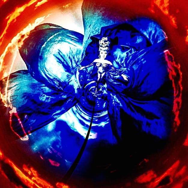 A close-up panel from One Piece, featuring Luffy in Gear 5 mode, battling against Kaido amidst a fiery and chaotic background, showcasing the intensity and evolution of the series.
