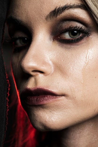 A close-up shot of a female lead in a J-Drama with tears in her eyes, showcasing a moment of vulnerability and emotional intensity.