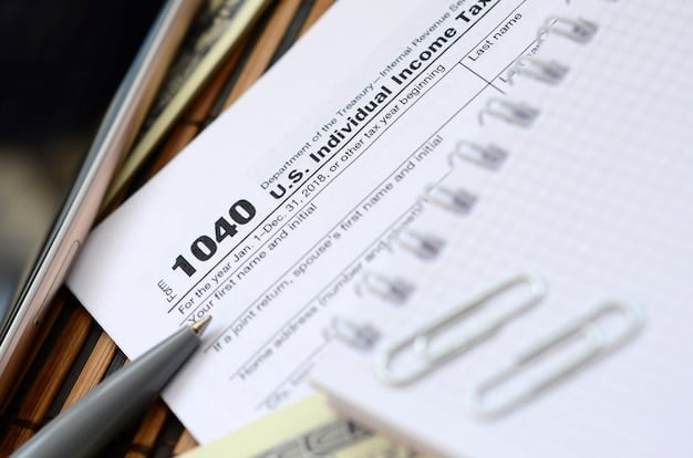 A close-up shot of a legislative bill document highlighting sections related to tax incentives for digital media production. A pen rests on top of the document, suggesting active review and consideration.