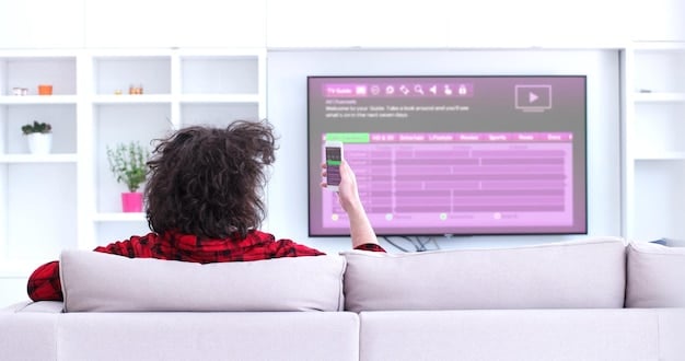A person using voice commands to navigate a streaming service on their smart TV. The TV screen displays a simplified user interface with large, easy-to-read icons and text.