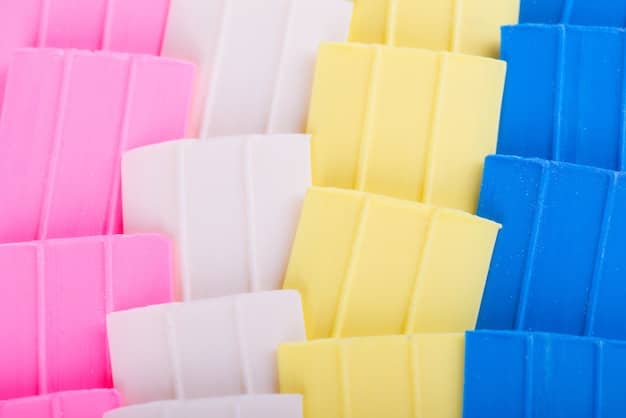 A selection of different types of craft foam, including EVA foam rolls, foam sheets in various colors and thicknesses, and small tubs of foam clay. Tools such as cutting mats, craft knives, and heat guns are also visible.
