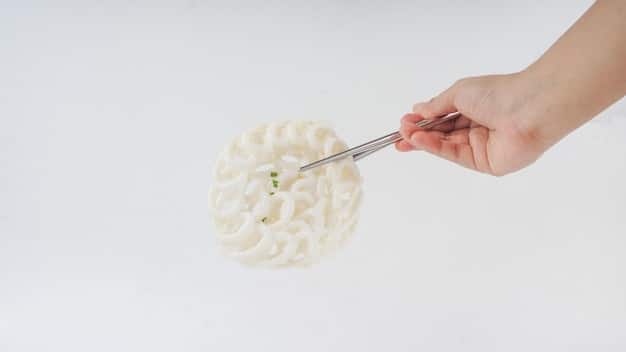 A cosplayer's hands demonstrating the layering technique on craft foam, showing how different foam pieces are stacked and glued together to create a raised, layered armor detail. Close-up of fine tool work.