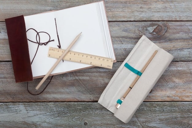 A workspace containing pattern paper, pencil, seam ripper, measuring tape, and fabric.