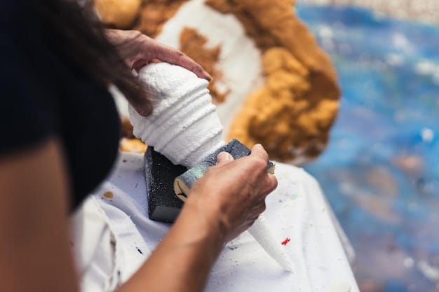 A detailed shot showing a cosplayer sanding a rough 3D-printed prop with sandpaper before painting. The focus is on the process of smoothing the surface to ensure a flawless paint job.