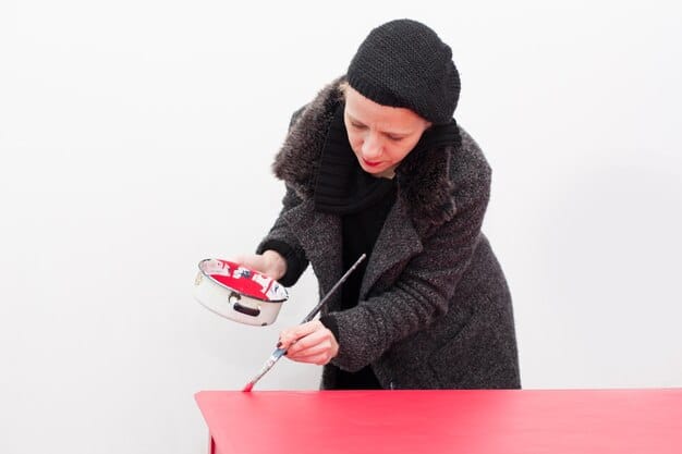 A cosplayer using a heat gun to carefully shape a piece of thermoplastic material over a shoe, demonstrating the use of heat and molding to create custom footwear components. The image highlights the precision and skill required for this technique.