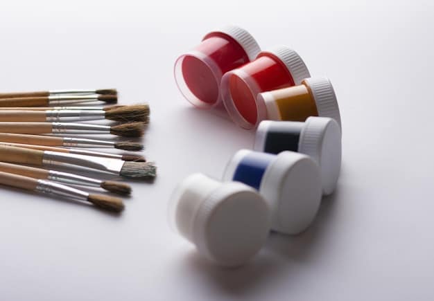 An assortment of body paints, including water-based and alcohol-based varieties, with different applicators such as brushes and sponges, ready for use.